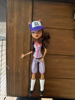 Monster High Clawdeen Doll in Purple, White & Black Striped Outfit